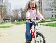 Learning to ride a two-wheeled bicycle